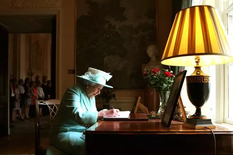 queen-elizabeth-ii-signs-the-visitor-book-prior-to-news-photo-1663088050